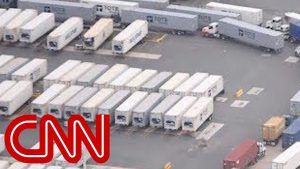 Thousands of containers with supplies sitting on Puerto Rico dock - YouTube