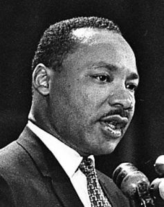 A threat to the powers that be. Martin Luther King was not only hated,but was feared by the people in power. He could move large numbers of people with a message of peace and tolerance, and was considering a political career. He was planning on running fo