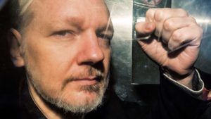 Julian Assange starts extradition fight from UK prison - CNN