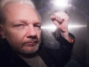 The Just World Fallacy: Why People Bash Assange And Defend